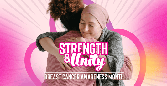 Strength & unity - breast cancer awareness month - two woman hugging one wearing a head scarf