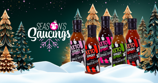 Four hungry squirrel sauces delightfully surrounded by snow, with a festive Christmas trees and snow, with text season's saucings