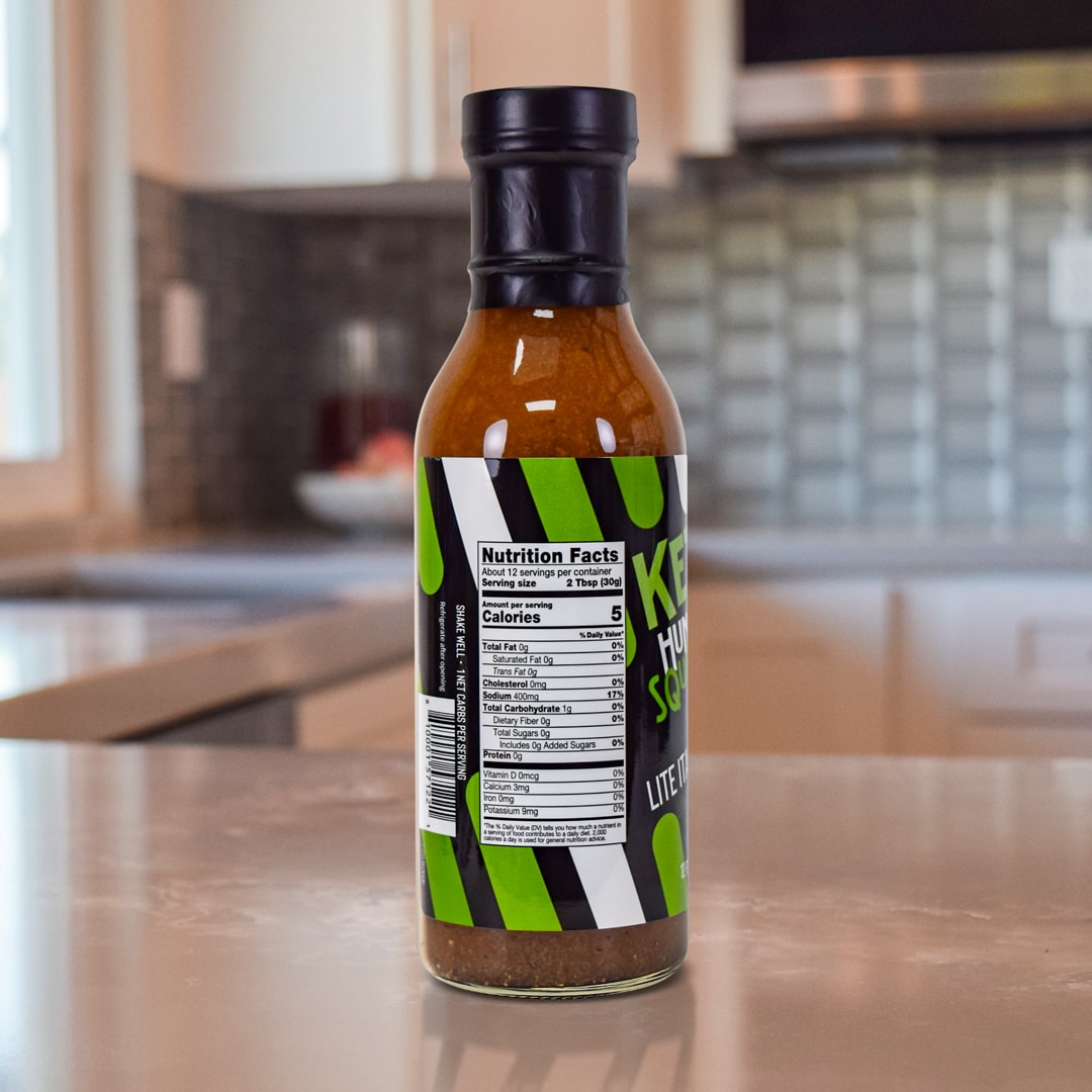 Lite Italian Dressing Product on top a kitchen counter  - Back of Bottle - for nutritional info please read below product description