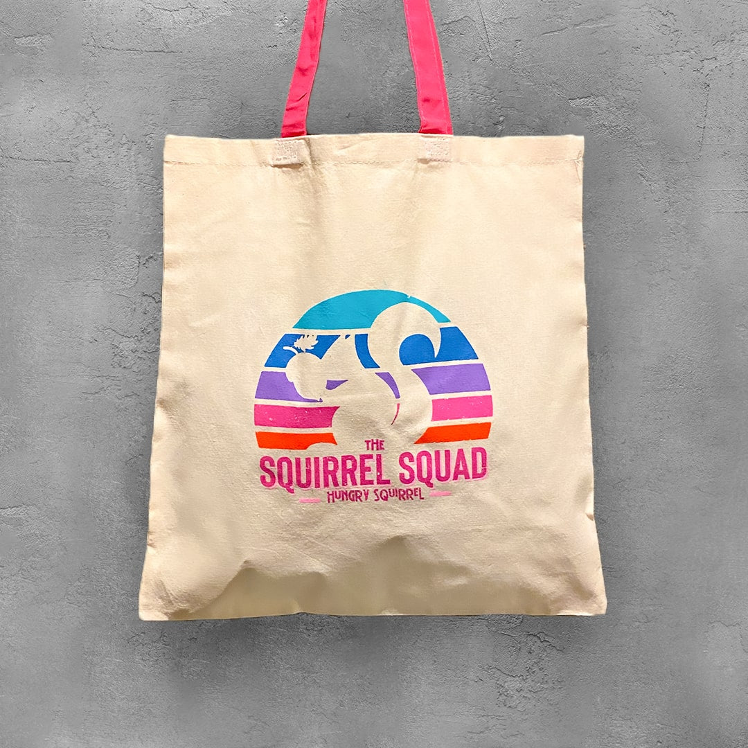 Beige Squirrel Squad Tote Bag with pink handle