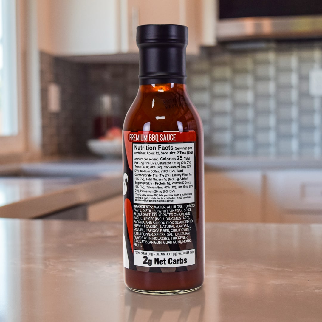 BBQ Sauce Product on top a kitchen counter- Back of Bottles - for nutritional info please read below product description