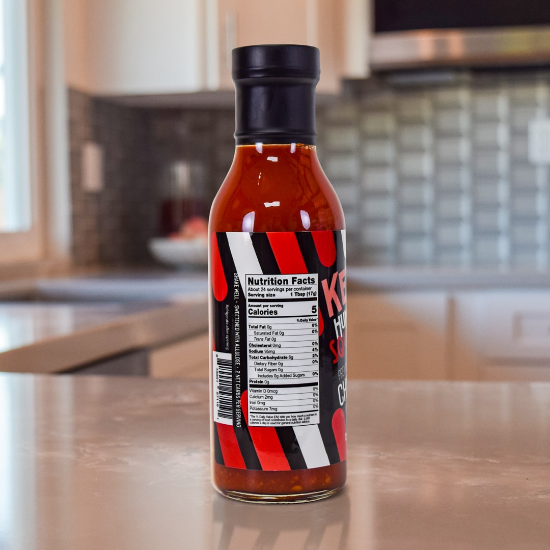 Sweet & Spicy Chili Sauce Product on top a kitchen counter  - Back of Bottle - for nutritional info please read below product description